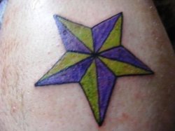 ai540.photobucket.com_albums_gg337_amantedibetta_Misc_tattoo5_1.jpg