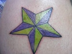 ai540.photobucket.com_albums_gg337_amantedibetta_Misc_tattoo4_1.jpg